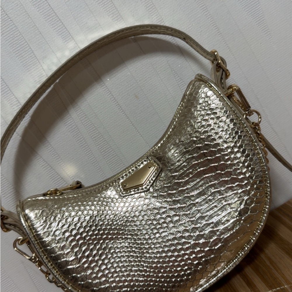 Elegant gold Aldo bag
